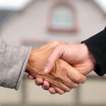 Handshake after buying a home